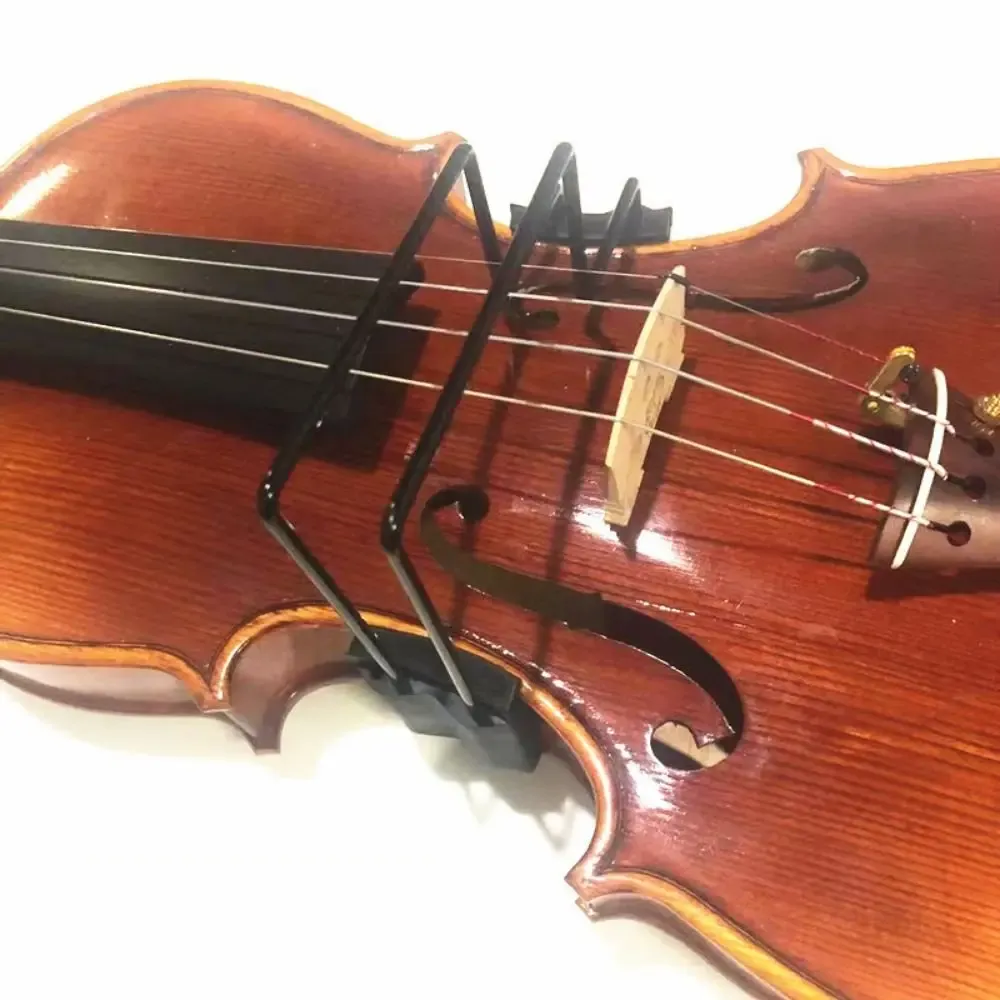 Correcteur d'archet de violon en usage