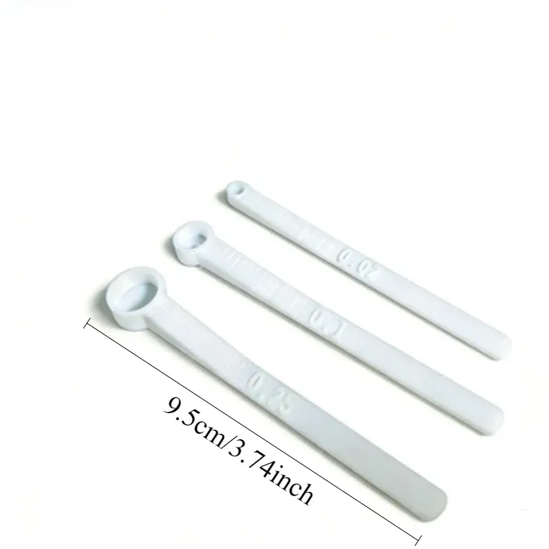 Détail des cuillères de mesure pour aquarium