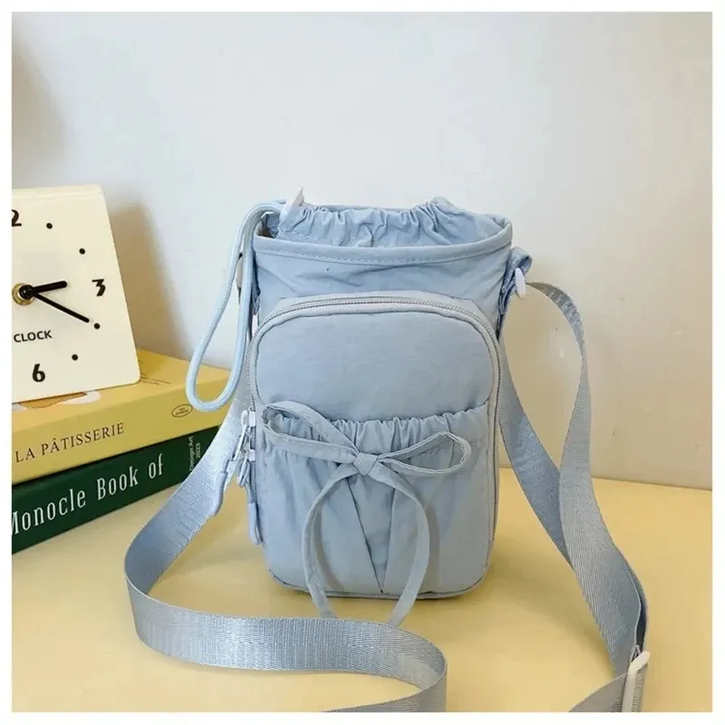 Sac bandoulière léger pour femme à design à nœuds, avec compartiment pour téléphone portable 10