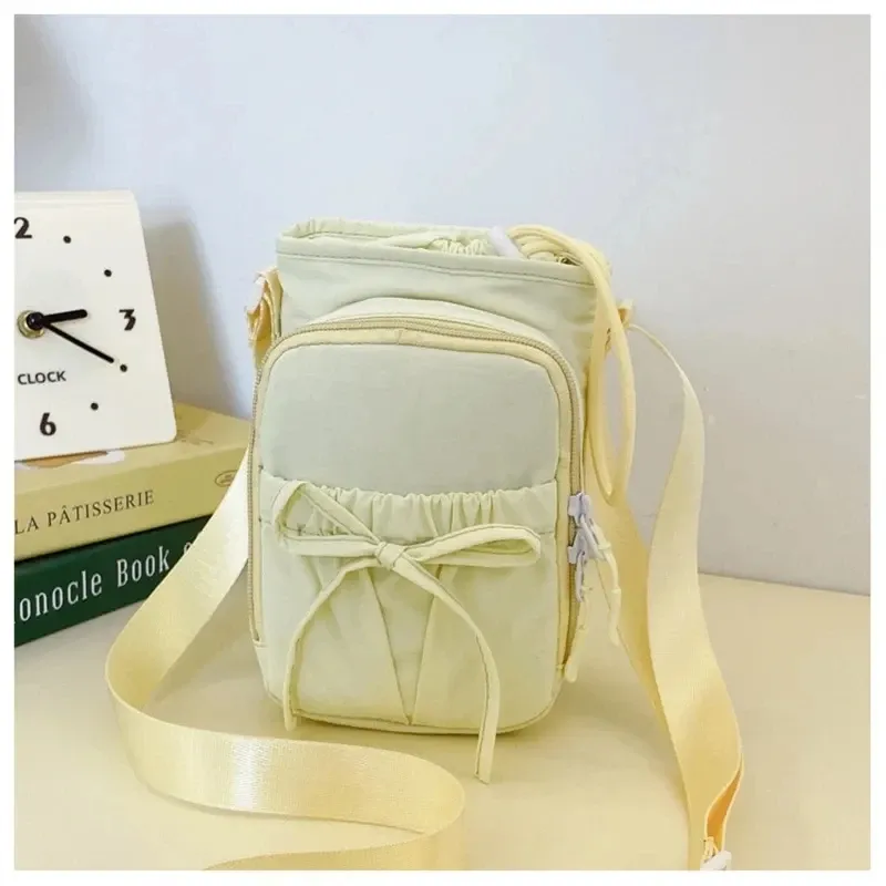 Sac bandoulière léger pour femme à design à nœuds, avec compartiment pour téléphone portable 9
