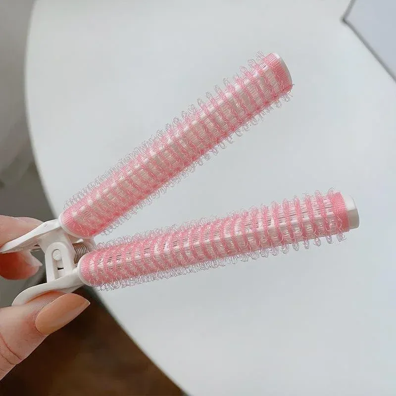 Pince volumisante pour racines, design