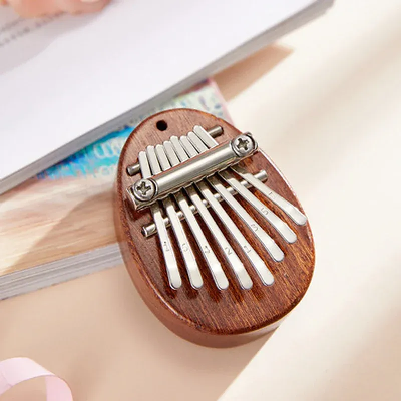 Piano à pouce 8 touches, Mini Kalimba exquis, piano à doigts portable, marimba pendentif, cadeau musical, clavier 8 touches, instrument de musique 2