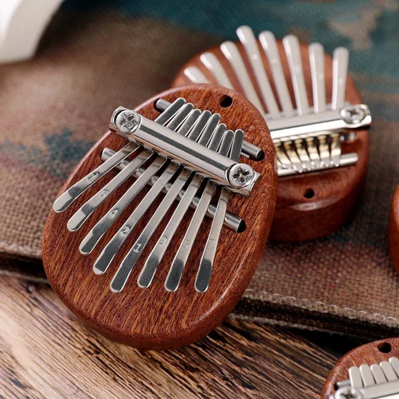 Piano à pouce 8 touches, Mini Kalimba exquis, piano à doigts portable, marimba pendentif, cadeau musical, clavier 8 touches, instrument de musique 5
