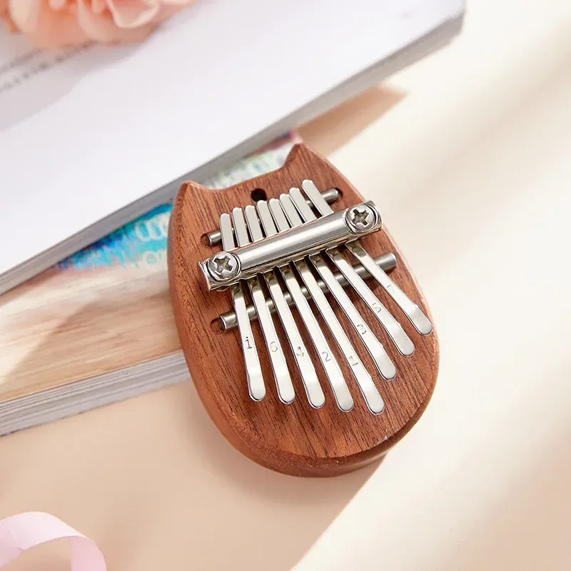 Piano à pouce 8 touches, Mini Kalimba exquis, piano à doigts portable, marimba pendentif, cadeau musical, clavier 8 touches, instrument de musique 12
