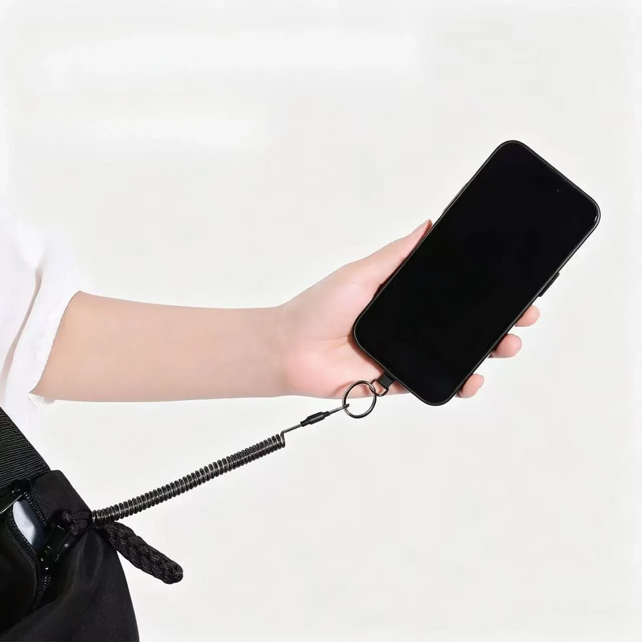 Cordon de sécurité rétractable pour téléphone avec patch adhésif, bracelet de poignet et mousqueton porte-clés 3