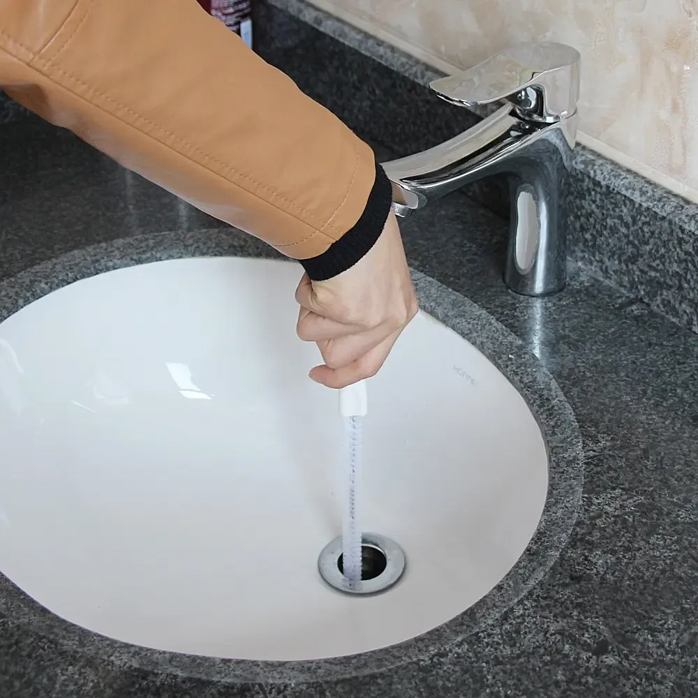 Brosse de dragage en situation d'usage quotidien