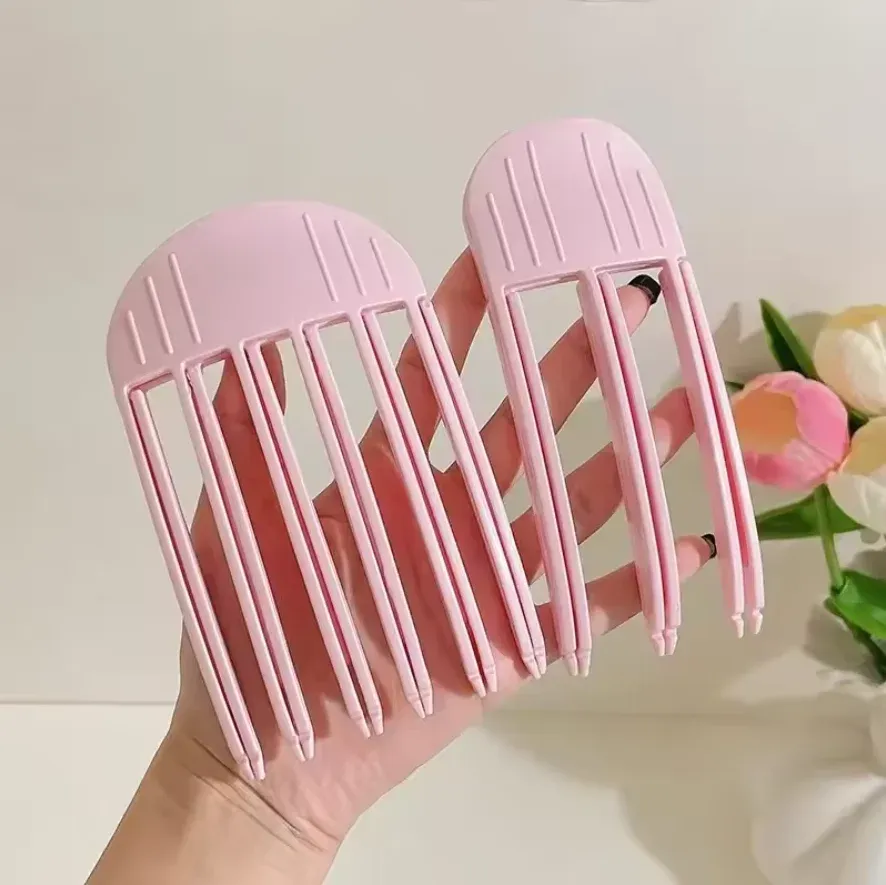 Détail du peigne à racines pour cheveux moelleux
