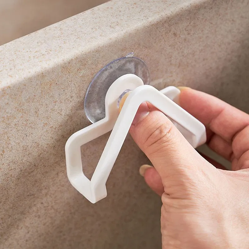 Ventouse multifonction pour évier avec égouttoir et porte-éponge 5