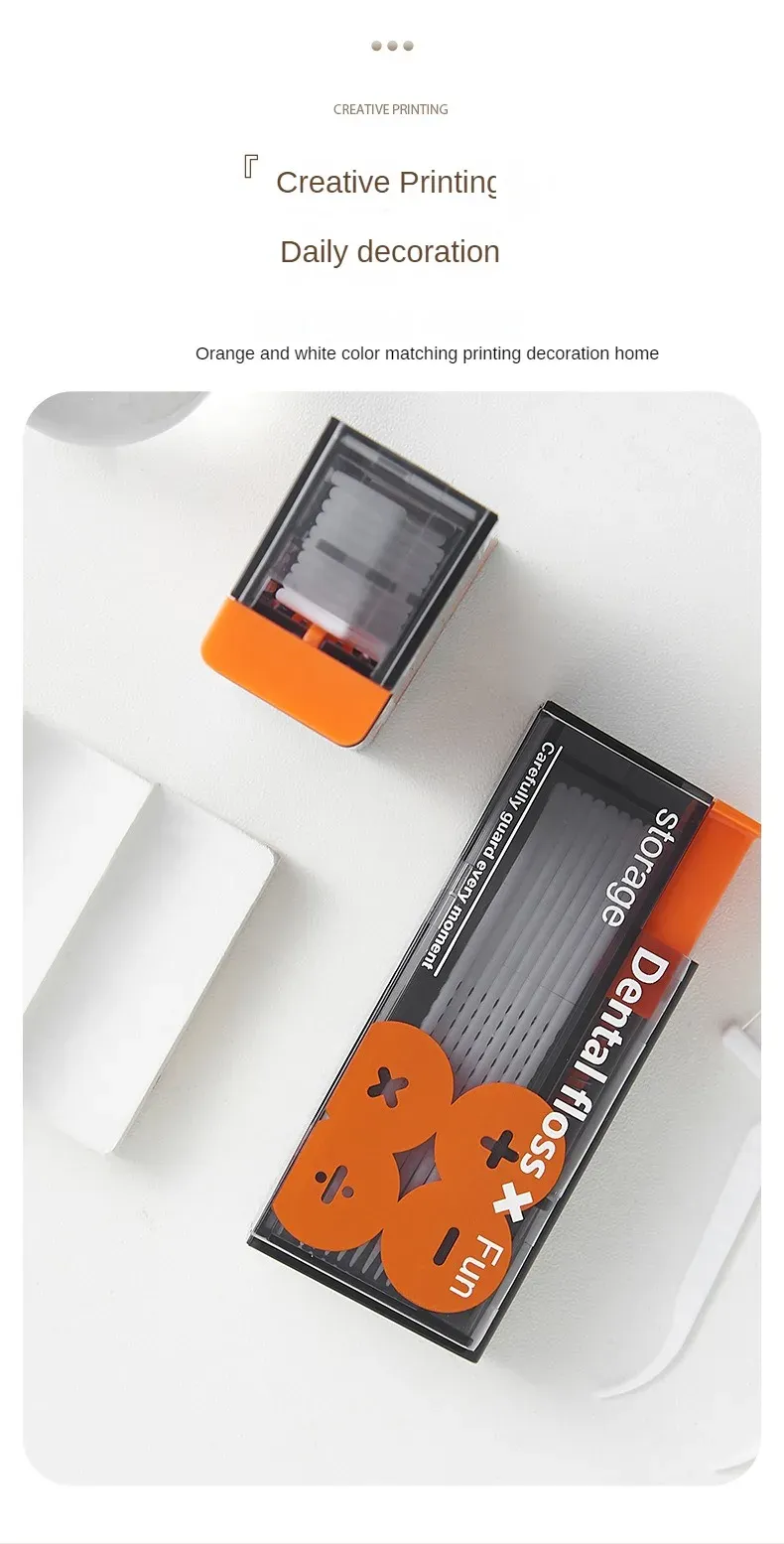 Distributeur de fil dentaire, détail du bouton de distribution