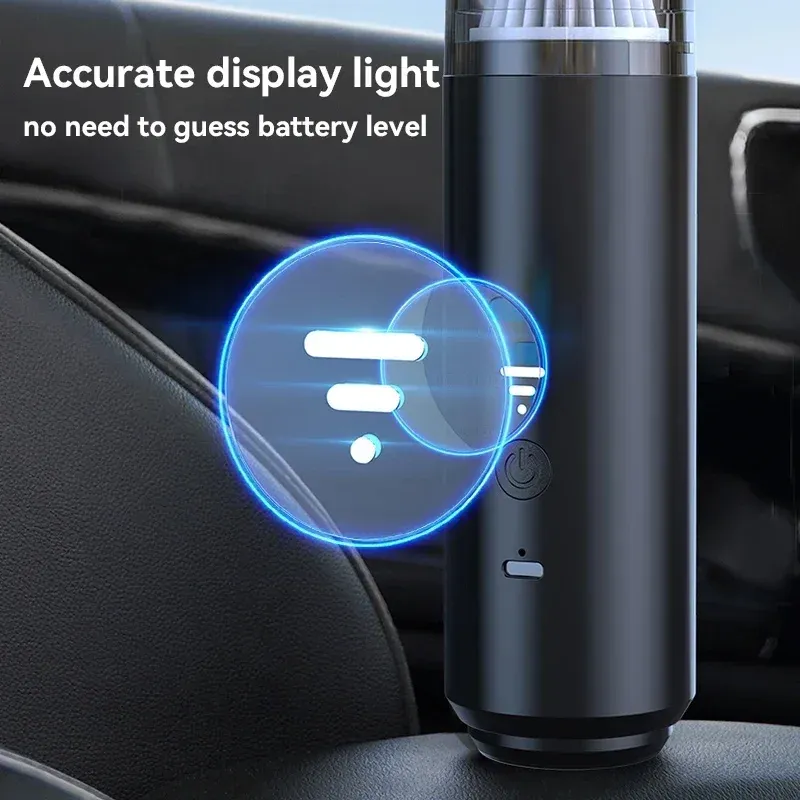 Aspirateur portable en utilisation dans un habitacle de voiture