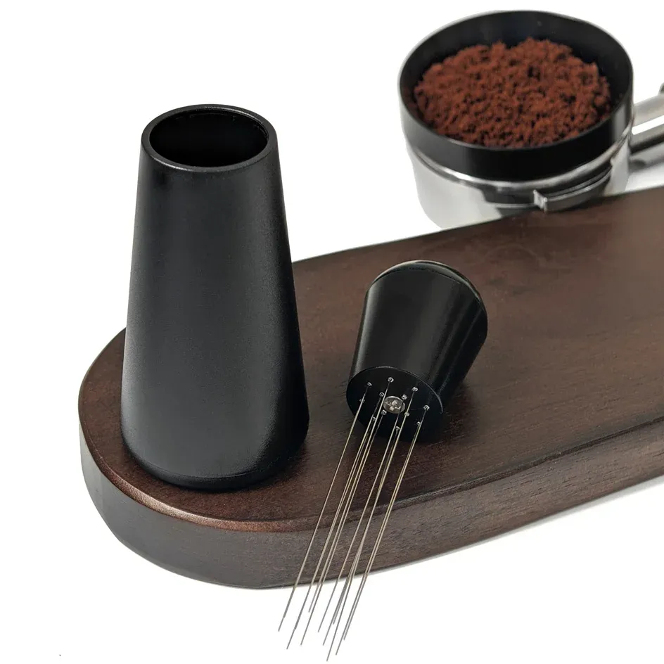 Distributeur de poudre de café pour une répartition uniforme