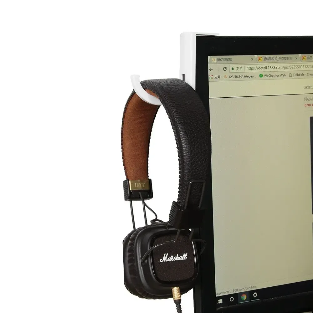 Support pour écouteurs dans un espace de travail