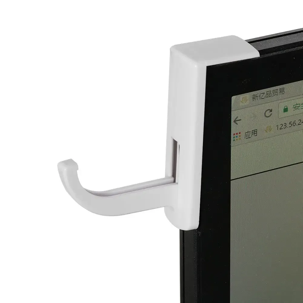 Support pour écouteurs installé sur un bureau