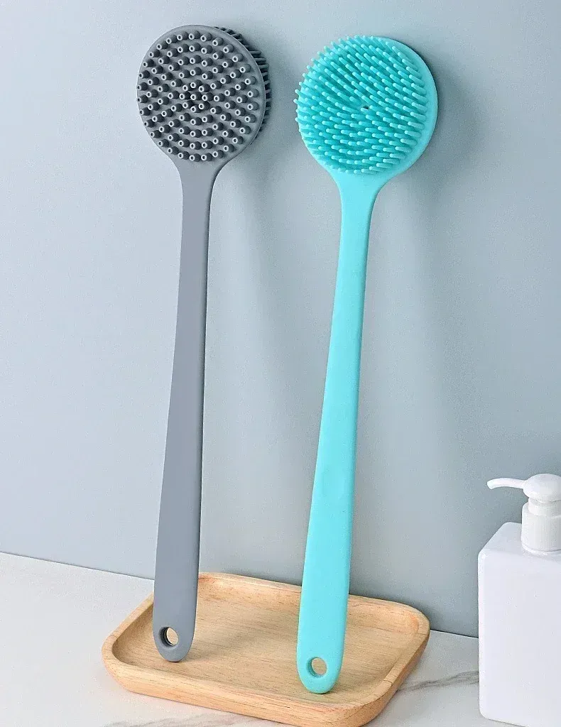 Face exfoliante de la brosse de massage