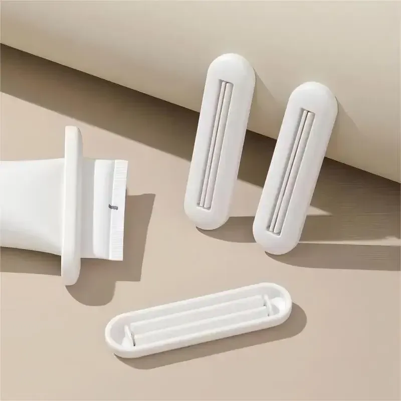 Presse-tube à dentifrice, distributeur de dentifrice avec pince, presse-crème pour les mains, accessoires de salle de bain 3