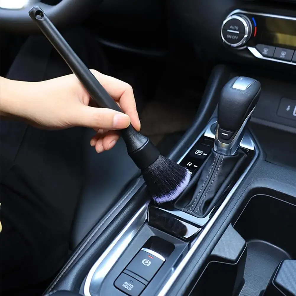Manche ergonomique de la brosse