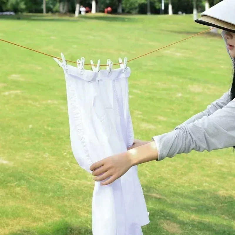 Corde à linge rétractable, dans son usage