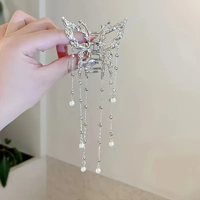 Détail de la pince papillon