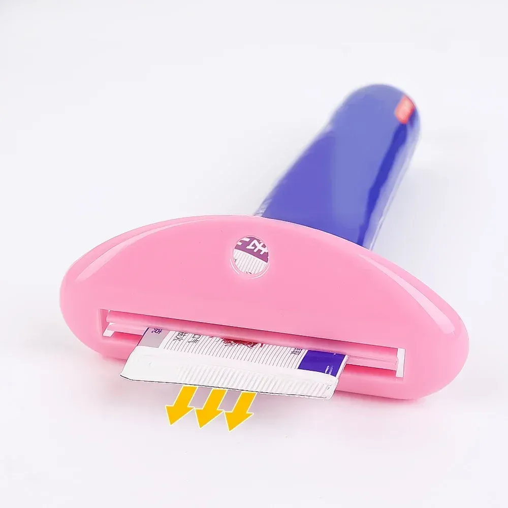 Distributeur de dentifrice fixé sur le bord du lavabo