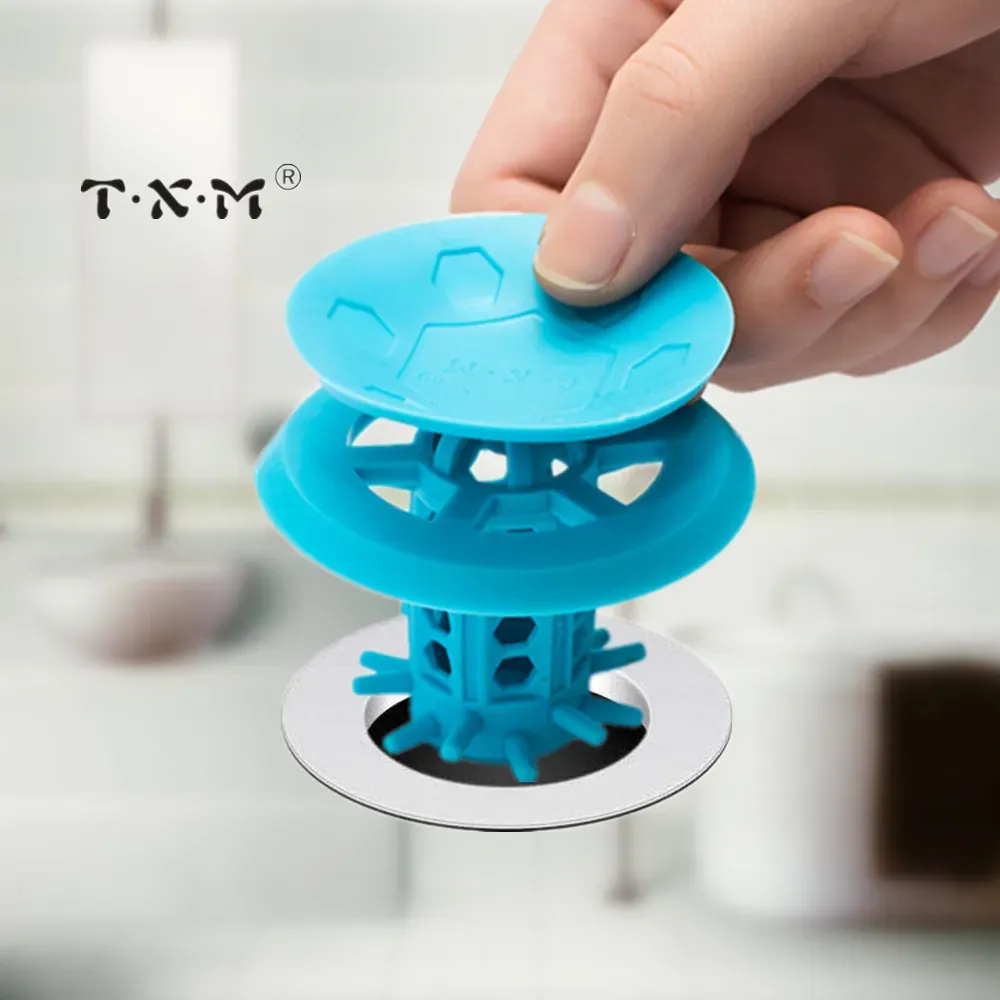 Collecteur de cheveux T·X·M en position bouchon