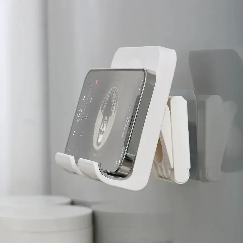 Support de téléphone fixé sur un mur de douche