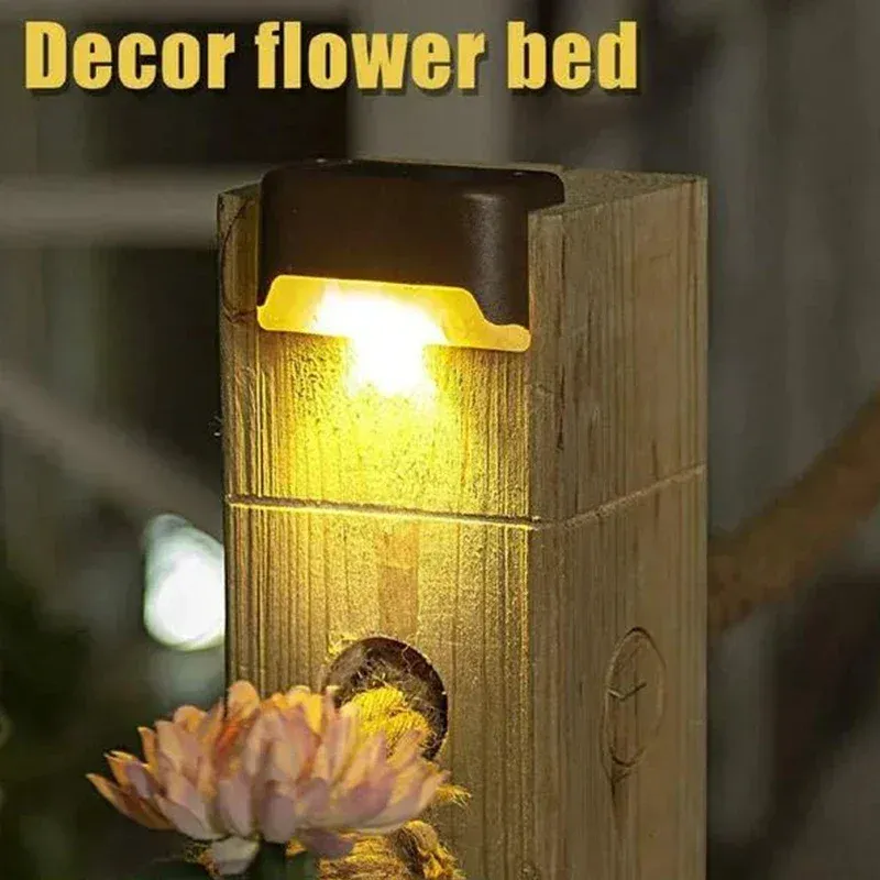 Lampes solaires balisant une allée de jardin
