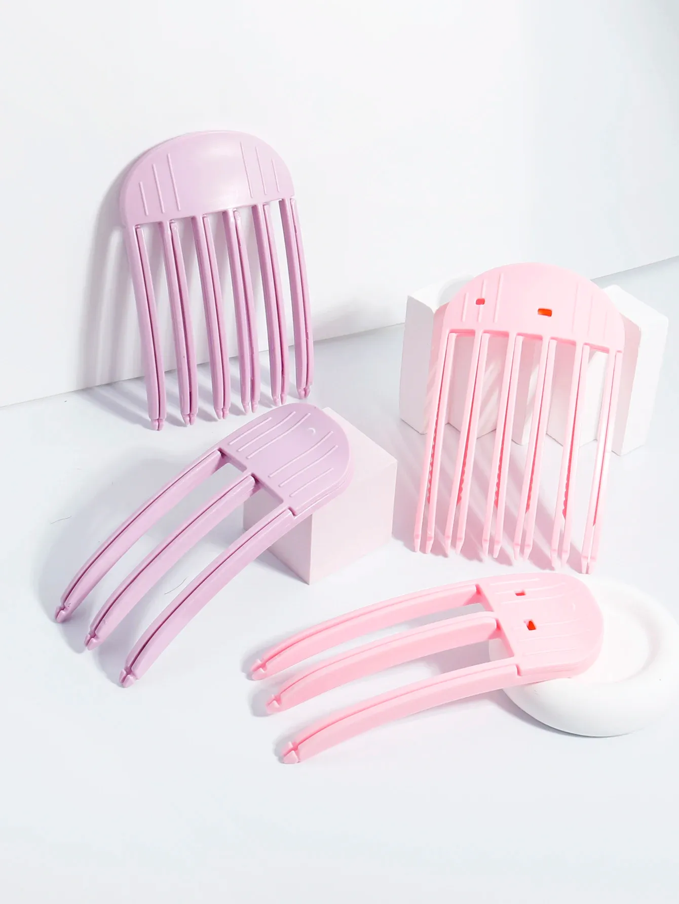 Pinces volumisantes en plastique pour cheveux