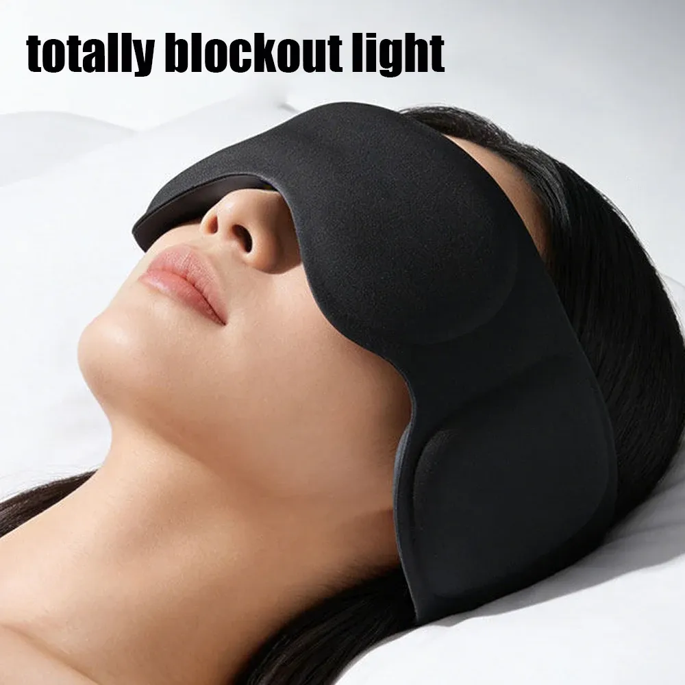 Masque de sommeil lesté porté avec cache-oreilles anti-bruit
