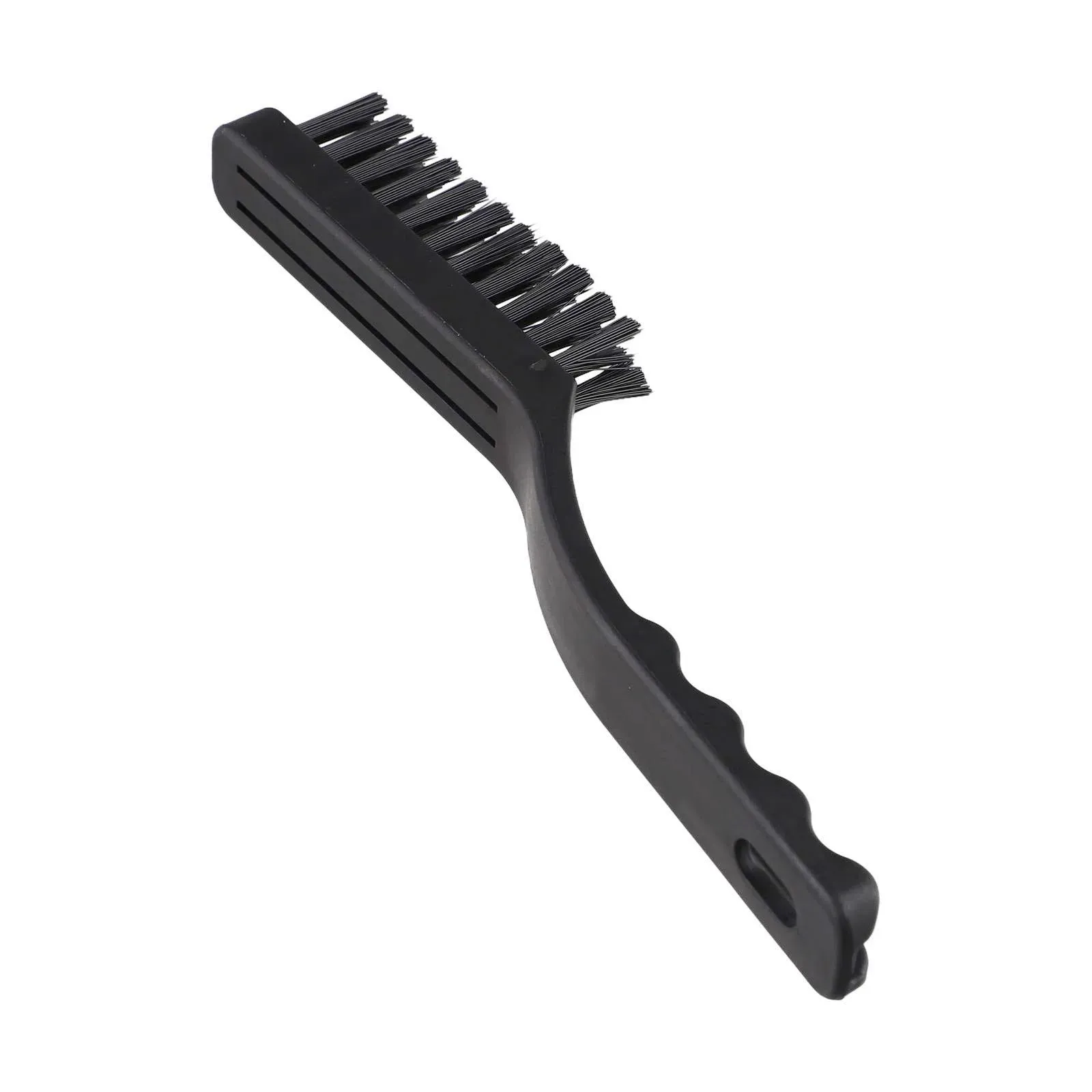 Brosse de nettoyage dans un atelier électronique