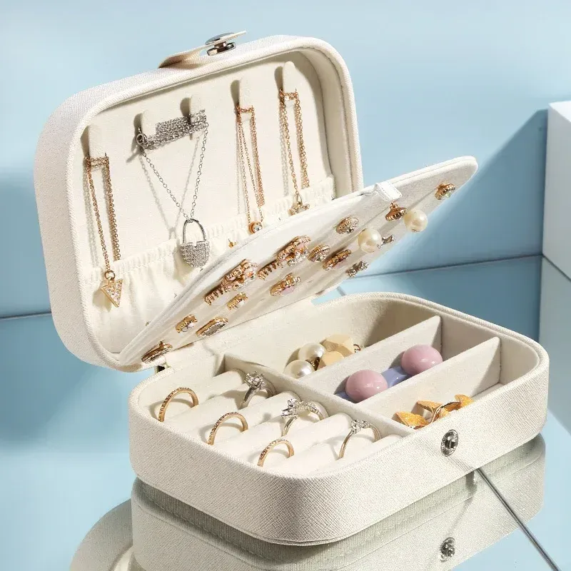 Boîte à bijoux de voyage portable en cuir avec fermeture à bouton et fermeture éclair 2