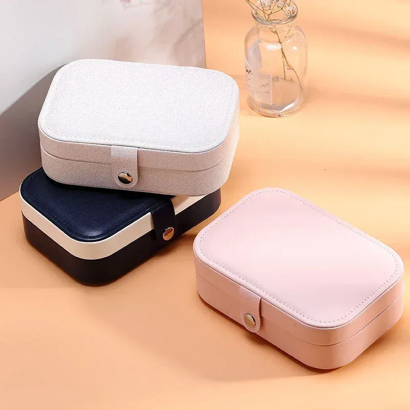 Boîte à bijoux de voyage portable en cuir avec fermeture à bouton et fermeture éclair 3