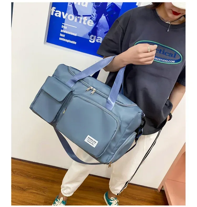 Sac de voyage femme, détail des poignées