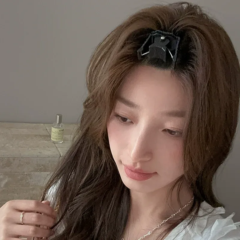 Pince à cheveux pour frange volumineuse