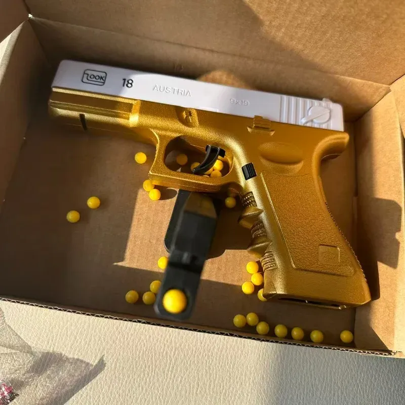 Pistolet jouet or blanc, présentation complète