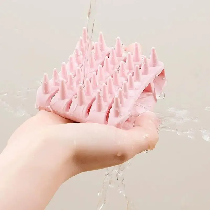Brosse de massage du cuir chevelu, prise en main