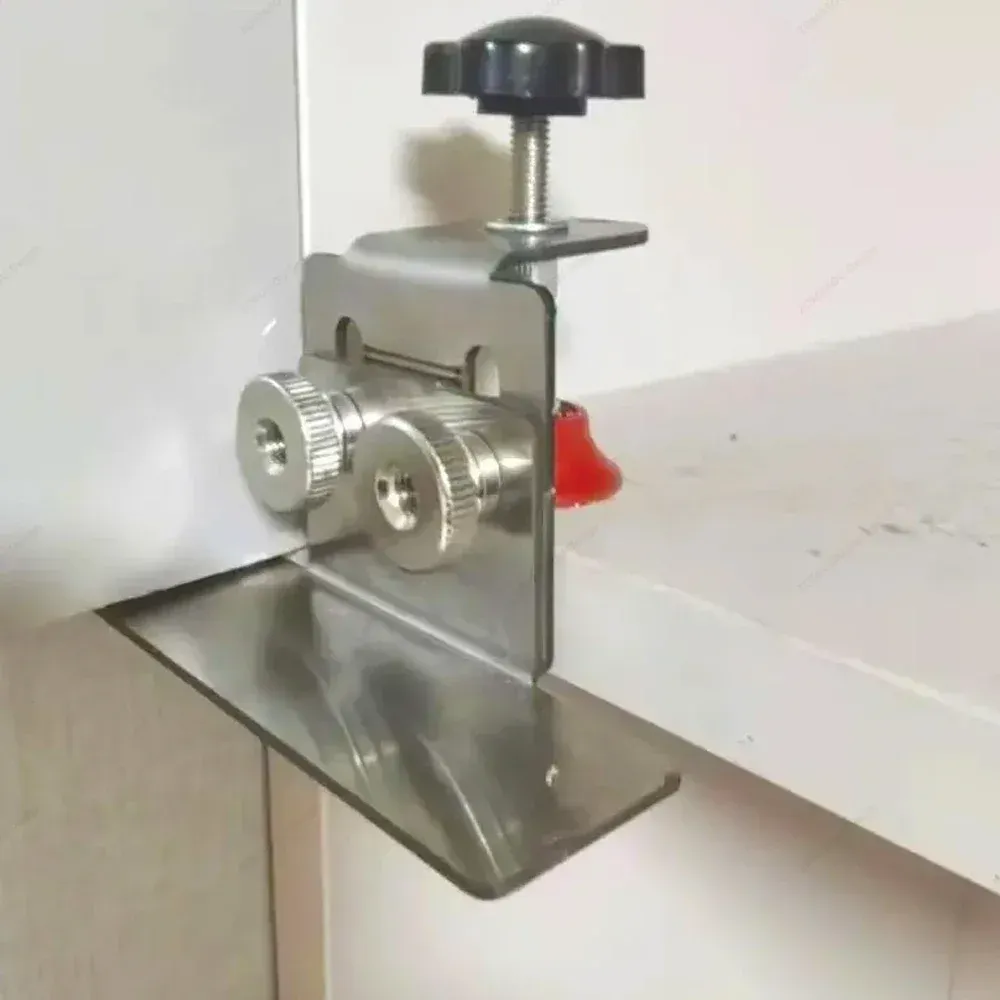 Positionneur de porte d'armoire utilisé pour le montage de portes