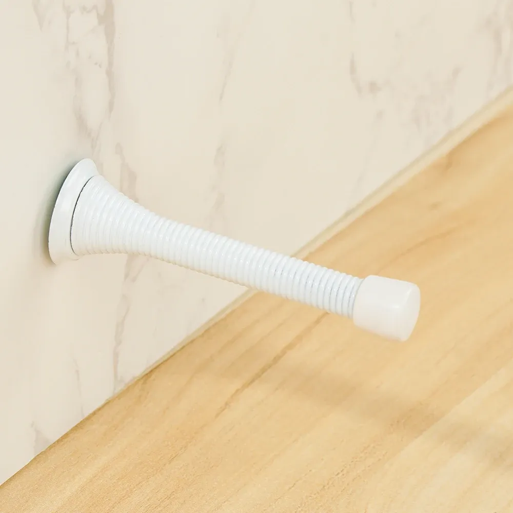 Butée de porte à ressort décorative, en intérieur