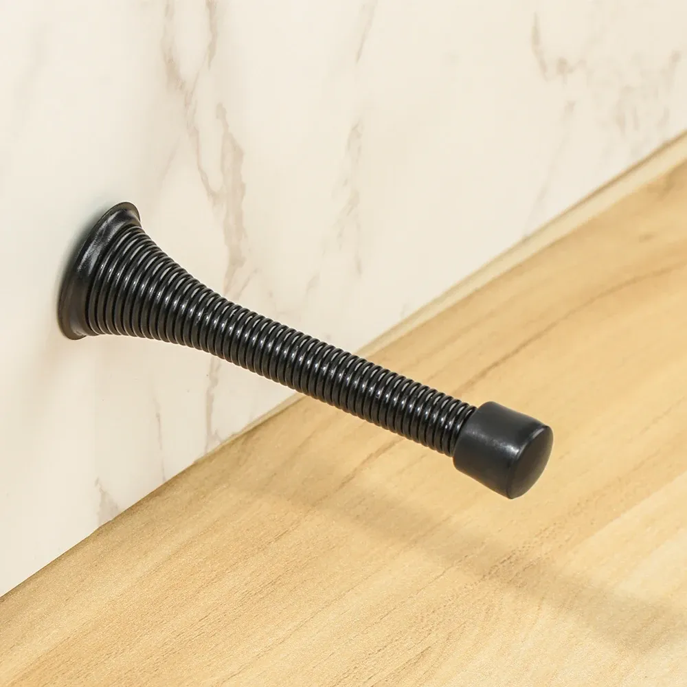 Butée de porte à ressort décorative, détail de la finition