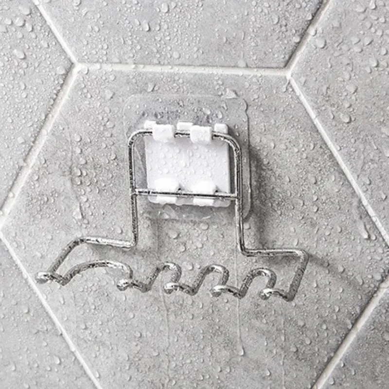 Porte-brosse mural en acier inoxydable dans une salle de bain