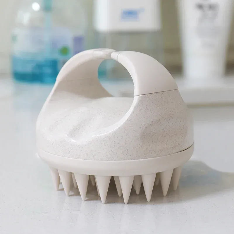 Brosse de massage pour cuir chevelu, prise en main