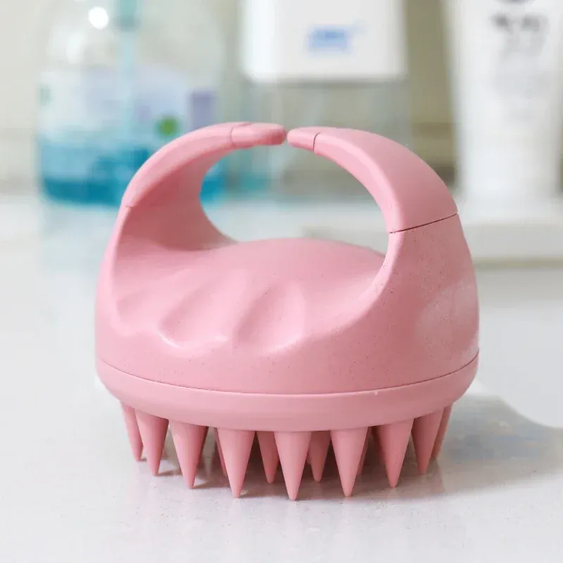 Brosse de massage pour cuir chevelu, design