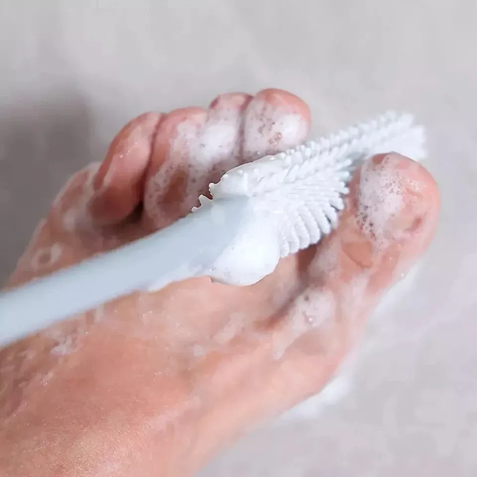 Brosse de lavage des pieds pour la douche