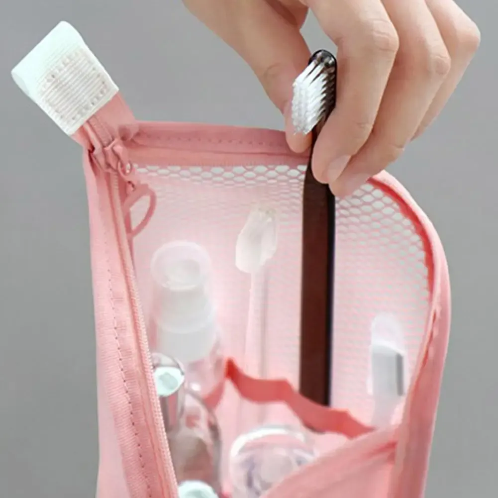 Trousse de toilette en maille avec fermeture éclair