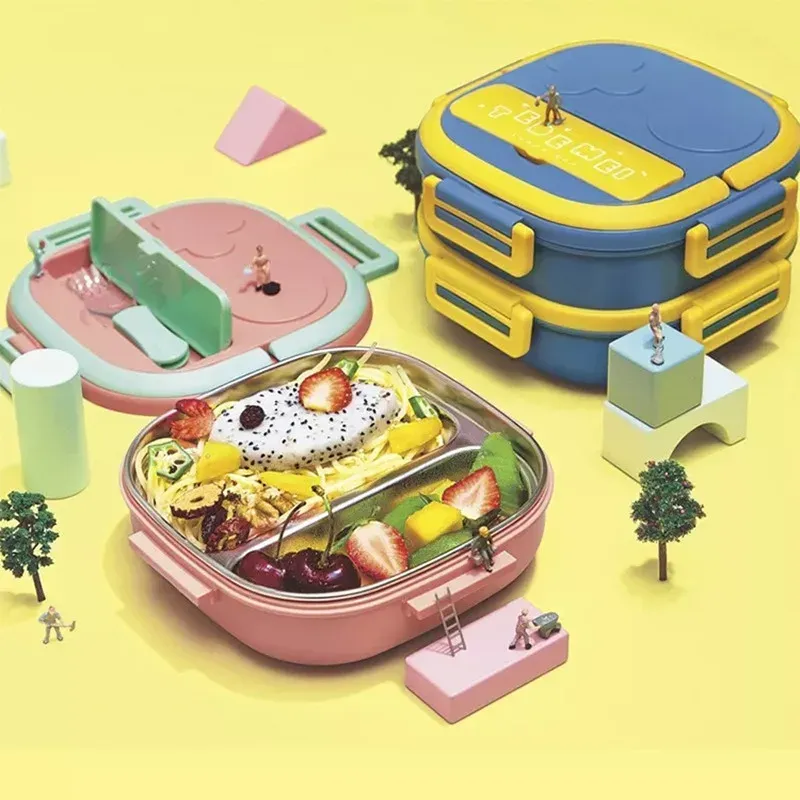 Boîte à bento colorée posée sur une table