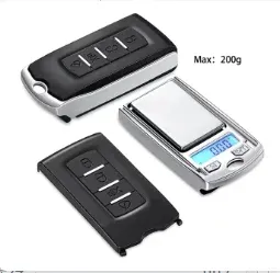 Balance de poche numérique en forme de clé de voiture, précision 0,01 g, capacité 100 g / 200 g, écran LCD 9