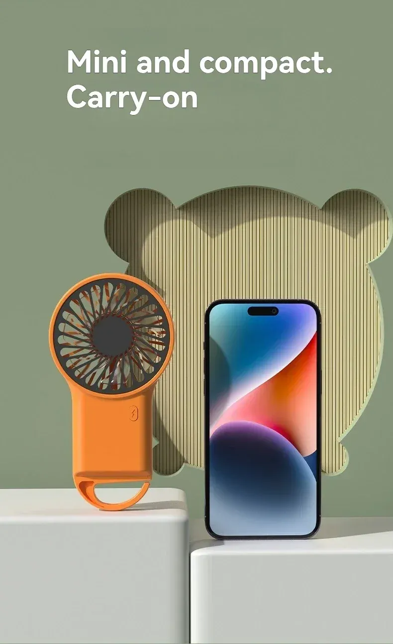 Mini ventilateur portatif, en main