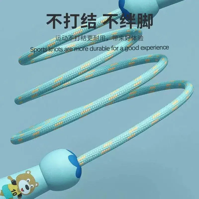 Corde à sauter réglable en coton pour enfants, design ludique avec dessin animé, poignée en bois naturel 2