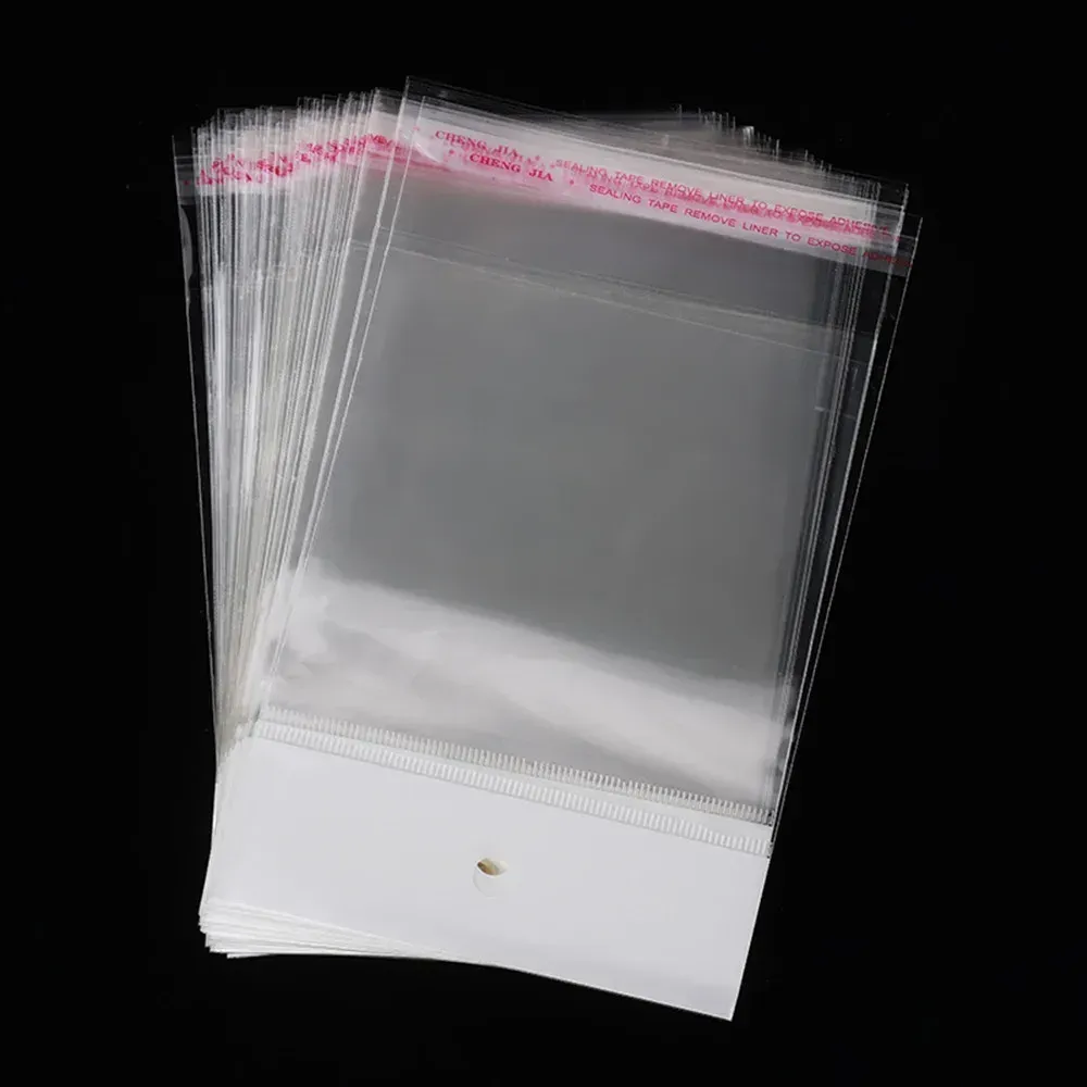 Lot de 200 sachets transparents auto-adhésifs avec support cartonné et trou de suspension - Image 1