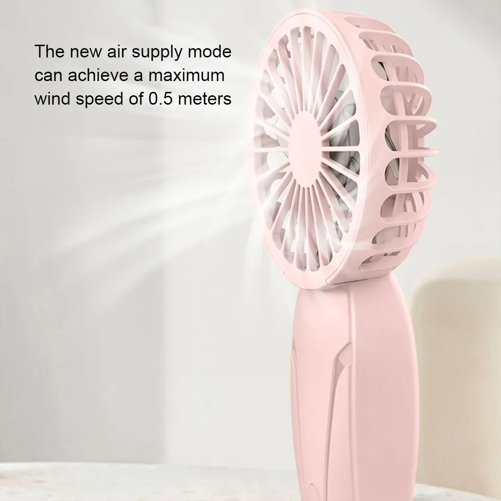 Mini ventilateur portable en situation d'utilisation