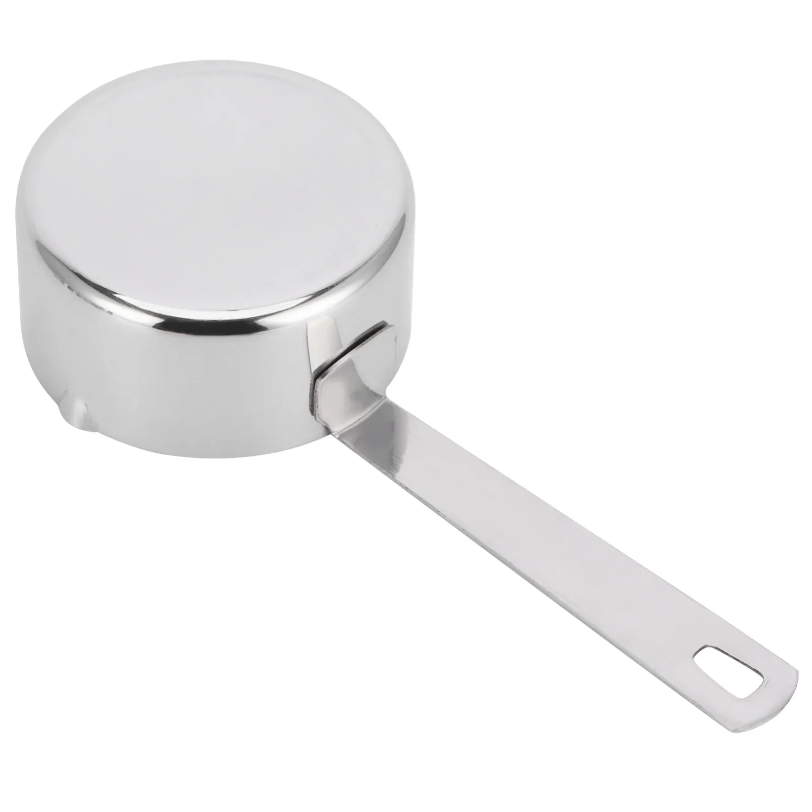 Cuillère doseuse utilisée pour mesurer des ingrédients